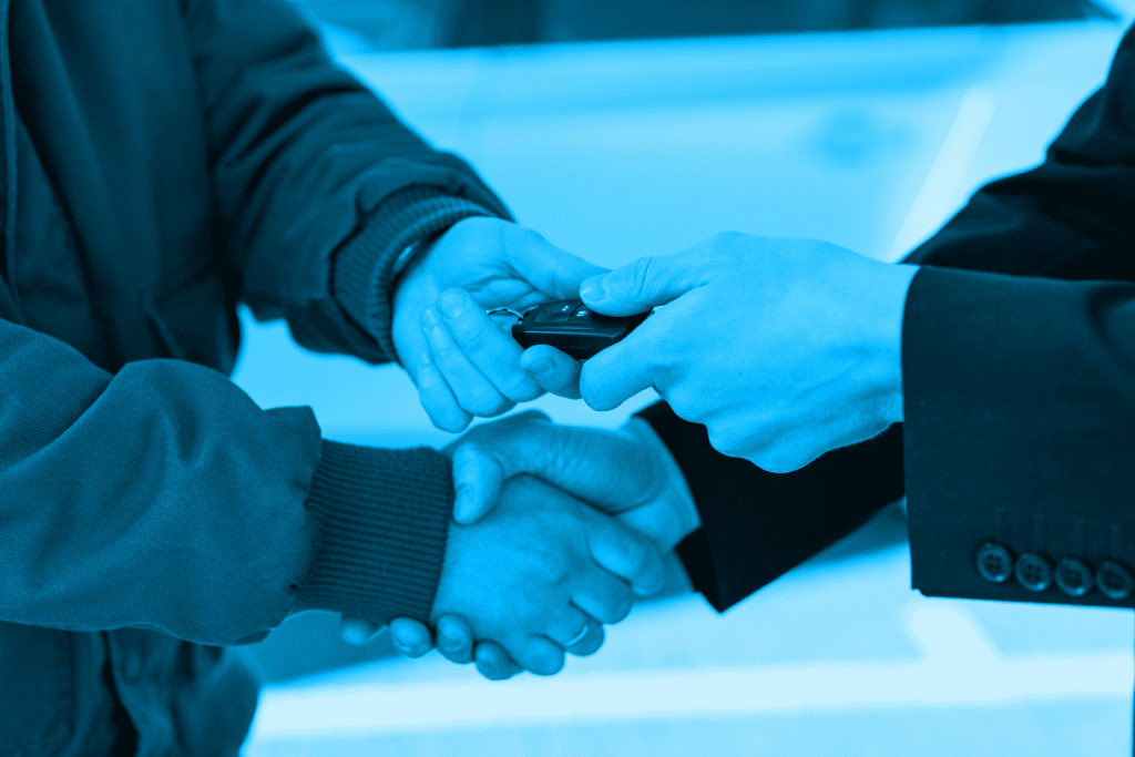 Car keys being exchanged